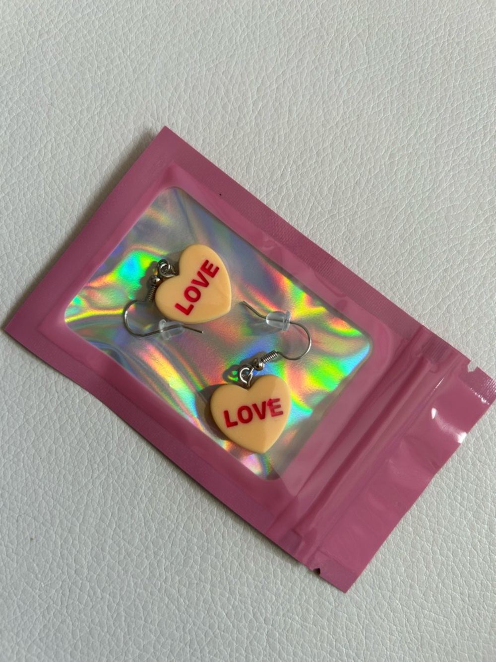Conversation Hearts Love Dangle Drop Earrings in Orange with Pink Lettering - Picture 4 of 4
